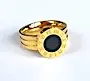 Anillo de Acero dorado con círculo negro